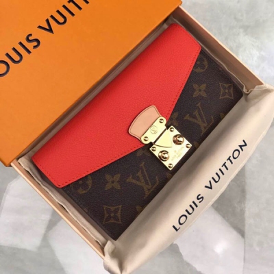 LOUIS VUITTON LV路易威登 M58413橙 特別介紹 海外特供（專櫃貨） 這款功能多樣的錢夾設計極為精妙，時尚感十足又頗具實用性。色彩鮮活的帆布和標誌性的 S 形鎖既保證了錢夾的安全性，又令其流露精緻典雅之美